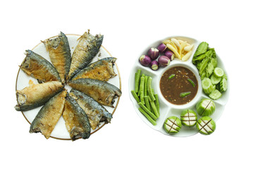 Shrimp paste sauce (Nam Prik Ka Pi) serve with vegetables and mackerel fish, Thai Food, isolate on white background
