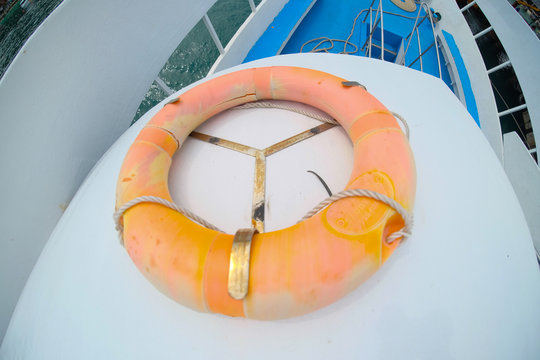 Lifebuoy hanged on the boat