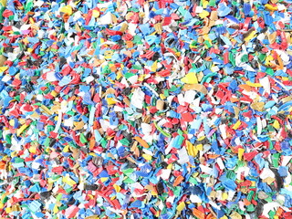 Shredded pieces of plastic in different colors