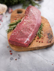 Beef Tenderloin on Wooden cutting Board