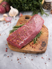 Beef Tenderloin on Wooden cutting Board
