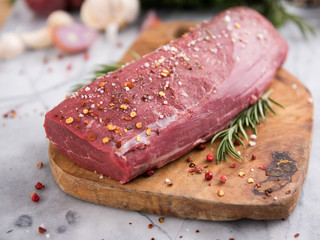 Beef Tenderloin on Wooden cutting Board