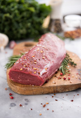 Beef Tenderloin on Wooden cutting Board