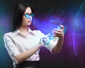 The concept of business, technology, the Internet and the network. A young entrepreneur working on a virtual screen of the future and sees the inscription: Human resources