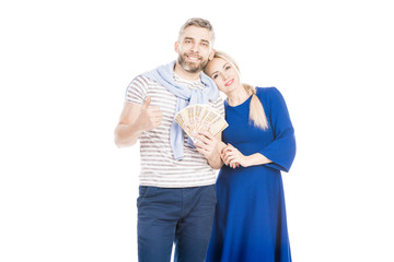 Attractive couple flashing their cash on white background