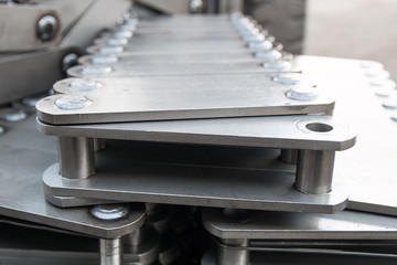 Fototapeta na wymiar industrial pulling block conveyor chain