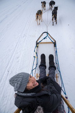 Smiling Woman dog sledging, Yellowknife, Northwest Territories, Canada