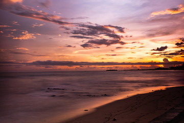 Beautiful sunset at calm beach in Bengal bay, Myanmar