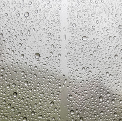 Wet glass background. Rain on the glass