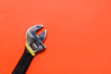 Used Pliers Tools on a orange textured background with space for text