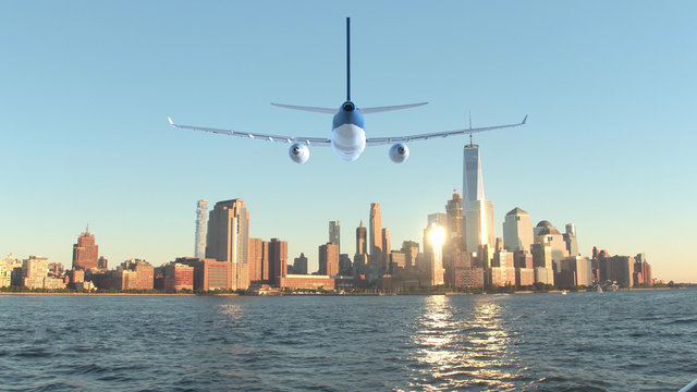 AERIAL: Spectacular Shot Of Passenger Plane Crossing Hudson River On Sunny Day.