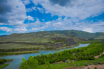 Naklejka na ściany i meble Beautiful aerial view of The Payette river in idaho, during a gorgeous sunny day and amazing landscape background