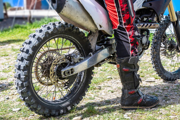 man riding a motocross in a protective suit