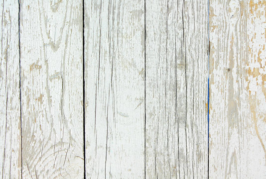 Wooden texture of white and yellow. Background of old painted boards. Retro and vintage. Free space for text. Horizontal image.