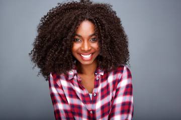 Close up stylish young african woman against gray background