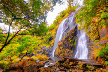Fototapeta na wymiar Beautiful waterfall stream at Khlong-Lan National Park, Thailand
