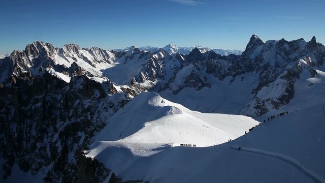 Skiers at the start of the Aiguille du midi, Chamonix-Mont-Blanc, French Alps, Haute Savoie, Chamonix, France