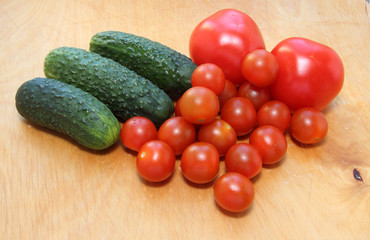 New harvest. Tomatoes and cucumbers.