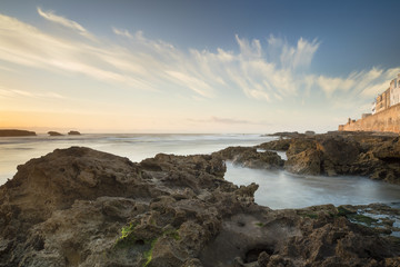 Fototapeta premium sunset time with beautiful clouds above Atlantic ocean in Morocco