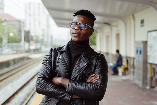 Black man standing on platform