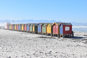 Colorful bathing cabins on the beach in Muizenberg in Cape Town, South Africa