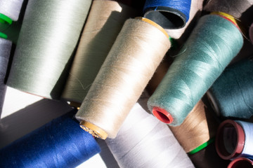 A set of colorful threads for sewing. Close up