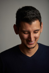 Fototapeta premium Looking down smiling young man