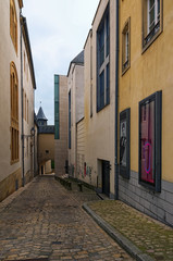 Luxembourg, Luxembourg-MAY 01, 2018: Traditional vintage houses in dark May morning. Spring urban landscape