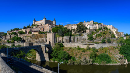Fototapeta na wymiar Alcantara Bridge and panorama of Toledo, Spain