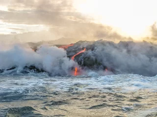 Fototapeten Kilauea Volcano in Hawaii Volcanoes National Park, also known Kilauea Smile because from 2016 seems to smile, erupting lava into Pacific Ocean, Big Island. Scenic sea view by boat. © bennymarty