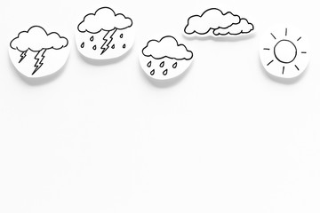 Modern weather icons set on white background top view copy space