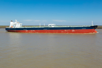 Oil tanker is on the Mississippi river.