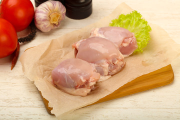 Boneless raw chicken thighs