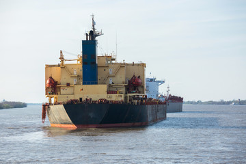 Big crude oil tanker at anchor in the Mississippi river.