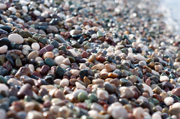 Sea pebbles on the shoreline, close-up