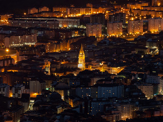Night aerial view of Oviedo from mount Naranco with cathedral and old town