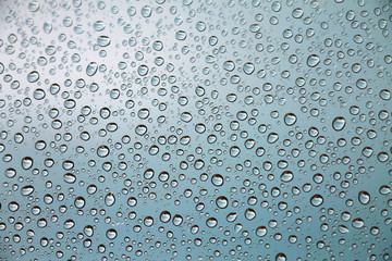 Rain drops on window glass , rainy day