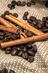 Fresh black coffe beans on cork table