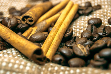 Fresh black coffe beans on cork table