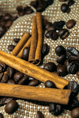 Fresh black coffe beans on cork table