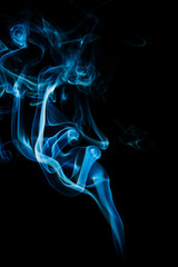 Abstract blue smoke isolated on black background