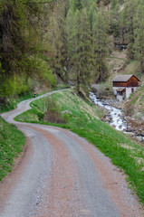 Small road through mountain terrain in Switzerland