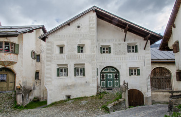 Fototapeta na wymiar Houses in rural village of Guarda in Switzerland