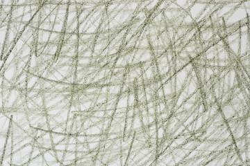 green crayon doodles on paper background texture