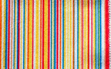Texture of fabric with colorful pattern vertical line.