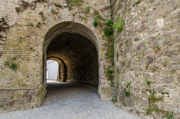 Fototapeta na wymiar Gate with tunnel in olf fortification in Germany