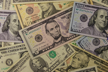 Background of different dollar banknotes