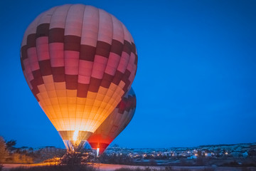 Morning start of Hot air balloon flying over Cappadocia.