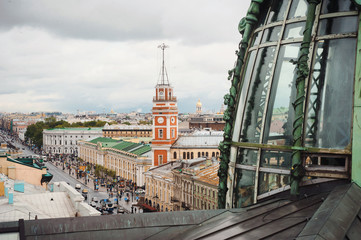 Panoramic view of the roofs with ventilation holes and chimneys, spiers, towers, domes of churches and cathedrals in the summer evening. Saint-Petersburg, Russia. Tourism world cup football 2018
