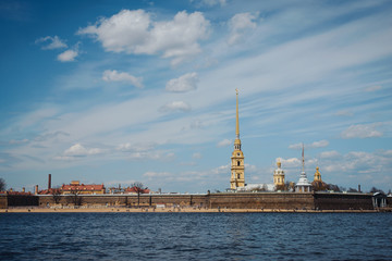 Naklejka premium Panorama of St Petersburg, Russia, with Peter and Paul fortress over Neva river, golden dome of St Isaac cathedral, Admiralty building and Rostral Column